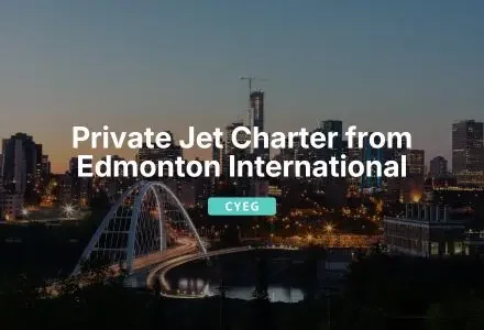 Edmonton skyline dusk illuminated bridge departure luxury private private jet charter