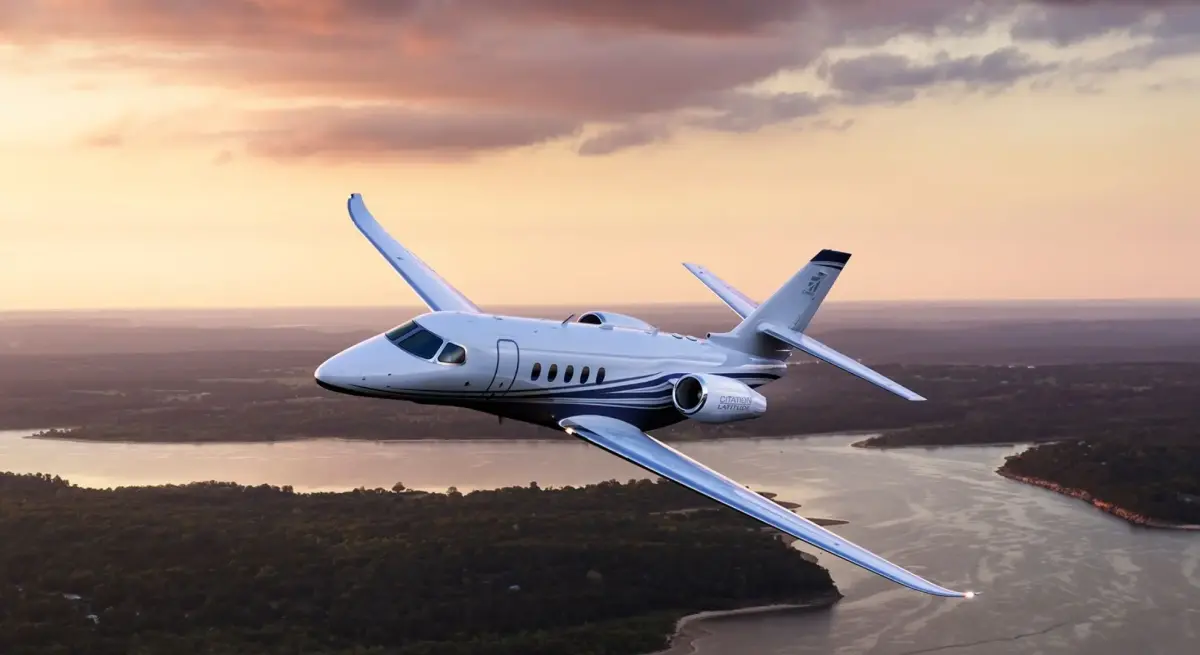 Cessna Citation Latitude midsize private jet cruising at sunset, available for charter on the Jakarta to Bali route