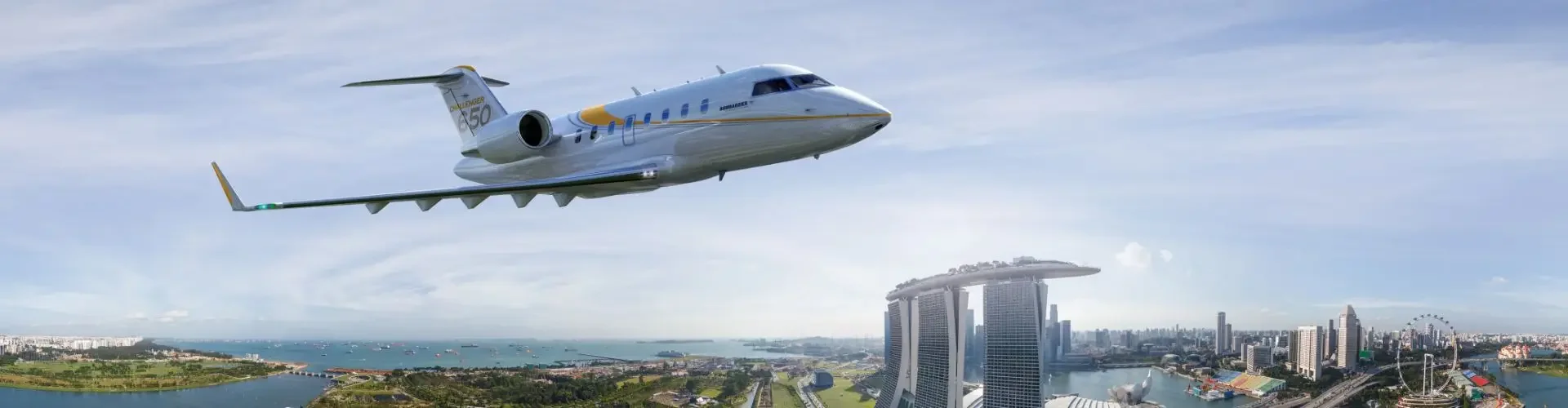 Private Jet Charter to Singapore Seletar Airport (XSP/WSSL) Private jet flying over Singapore's Marina Bay Sands and Gardens by the Bay, representing luxury charter flights to Seletar Airport with Jetbay