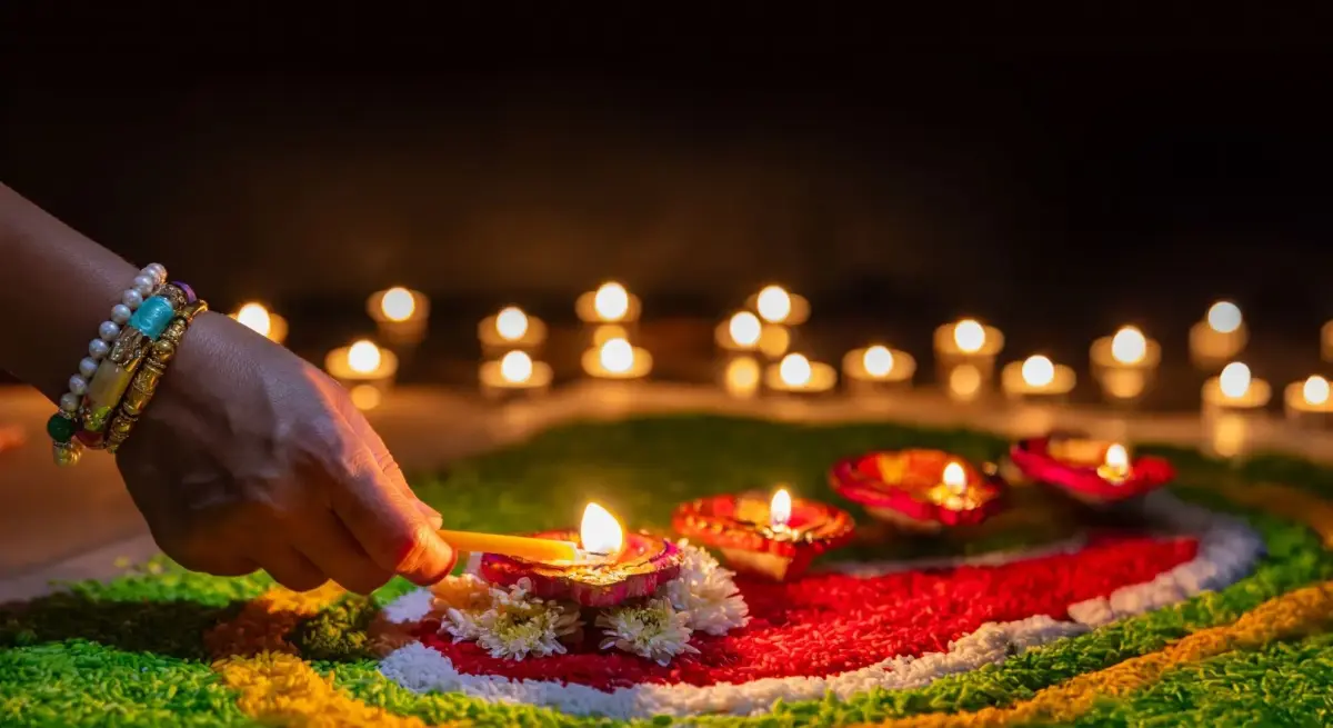 Clay diya lamps lit during Diwali celebration, or Deepavali, illustrating private jet travel for Diwali