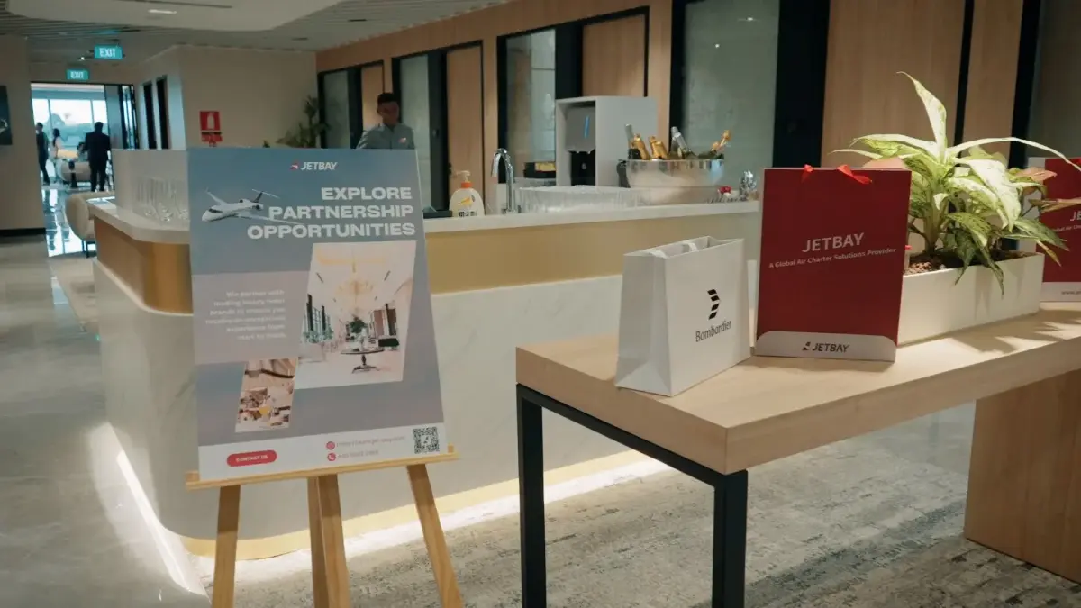Jetbay partnership opportunities display at Bombardier VIP networking event with branded materials and signage