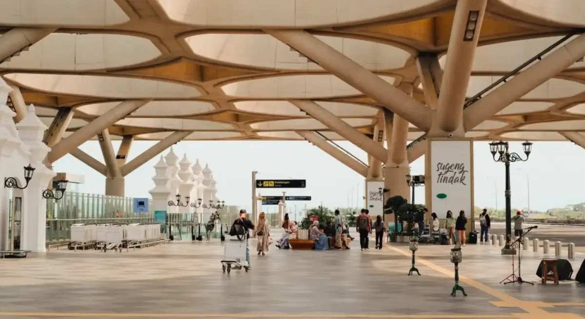 Juanda International Airport departure terminal in Surabaya featuring Javanese architectural canopy