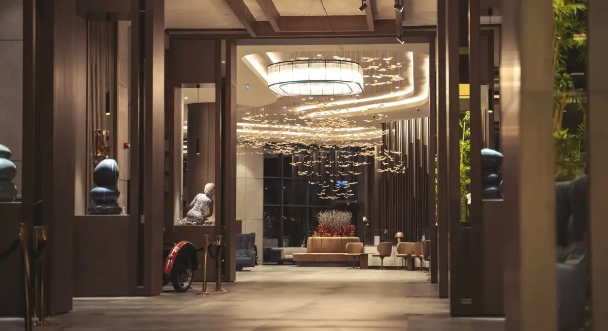 A grand hotel lobby, reflecting the hospitality standards for private jet charter passengers flying Jakarta to Palangka Raya