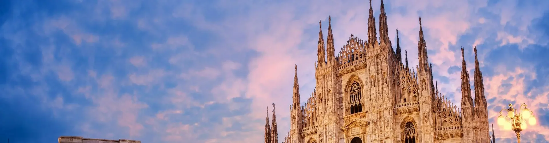 Private Jet Charter Milan Linate Airport Milan Cathedral Duomo di Milano in Italy during sunrise illustrating private jet charter to and from Milan Linate Airport
