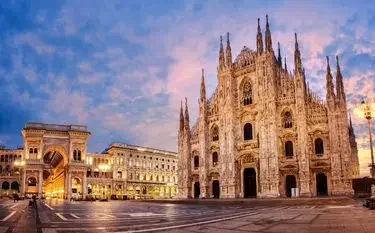 Private Jet Charter Milan Linate Airport Milan Cathedral Duomo di Milano in Italy during sunrise illustrating private jet charter to and from Milan Linate Airport