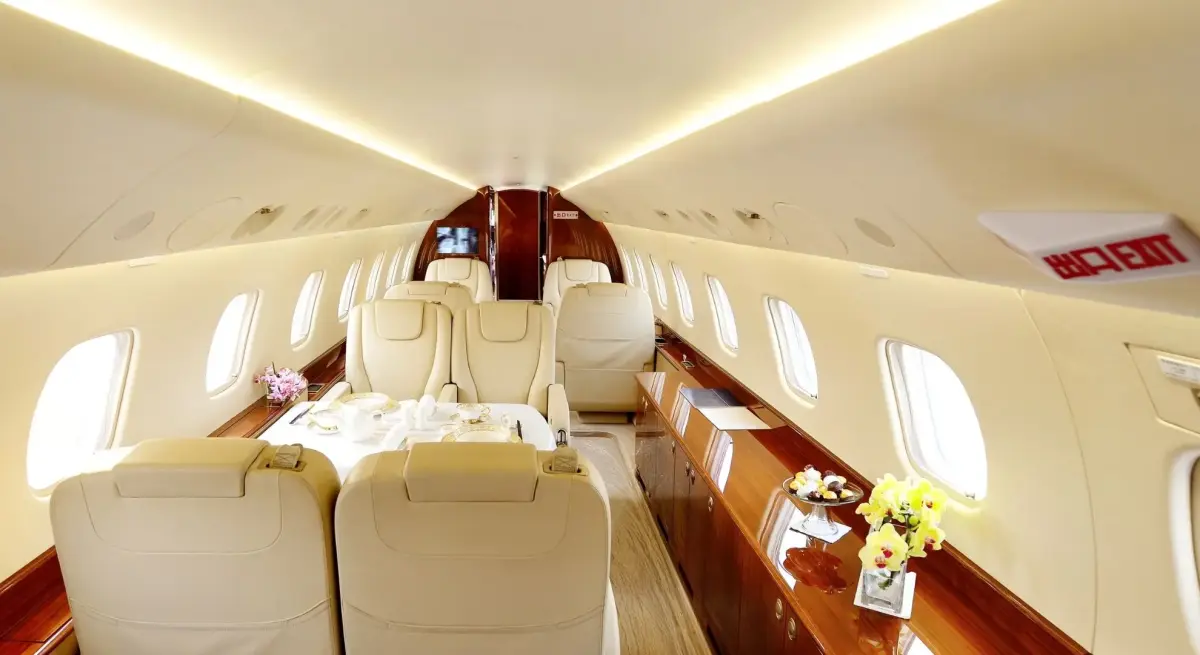 A private jet cabin flying to Venice Film Festival