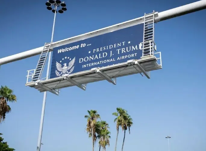 Overhead sign at President Donald J. Trump International Airport in West Palm Beach, Florida