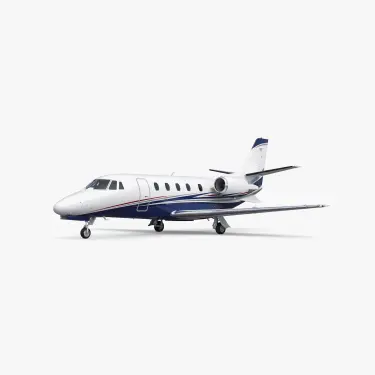 Citation XLS mid-size private jet with white fuselage and blue accent stripes on neutral background
