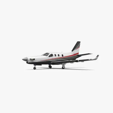Daher TBM 940 single-engine turboprop aircraft in white livery with red and black accent stripes