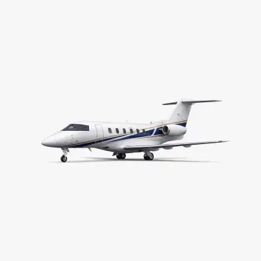 White Pilatus PC-24 super versatile jet with blue accent stripes on clean studio background