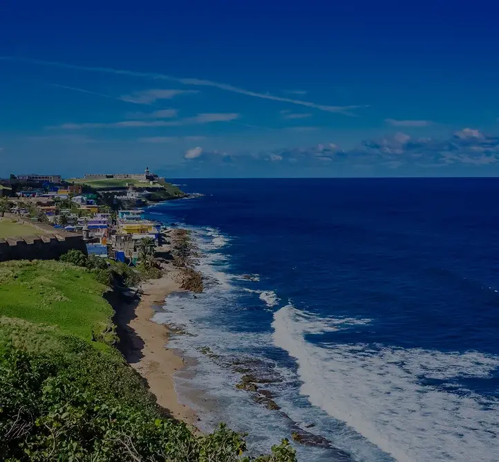Stunning aerial view of San Juan's historic coastline with colonial architecture and pristine beaches