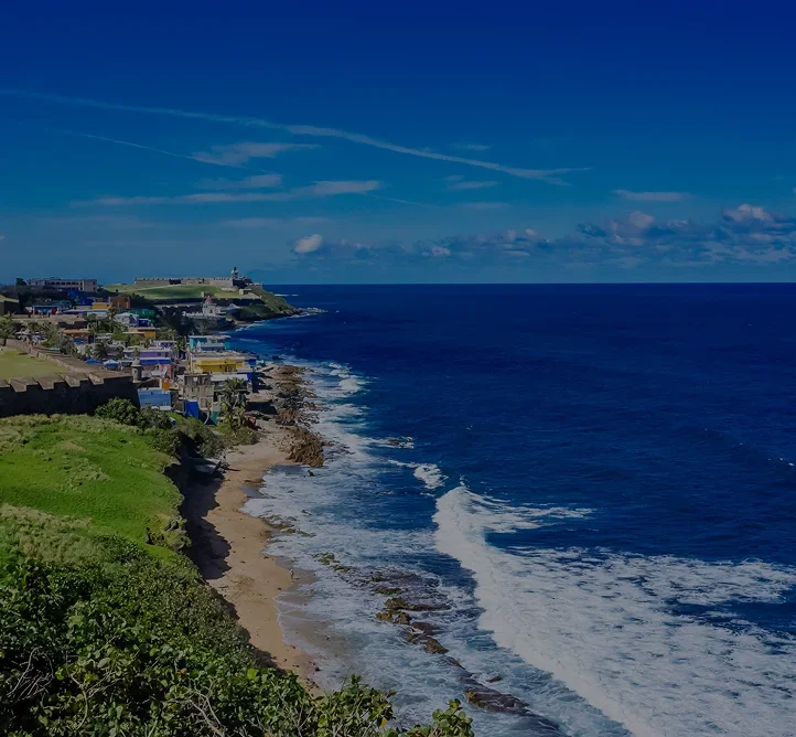 Stunning aerial view of San Juan's historic coastline with colonial architecture and pristine beaches
