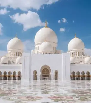 Abu Dhabi skyline and landmark attractions seen on descent during a private jet charter approach