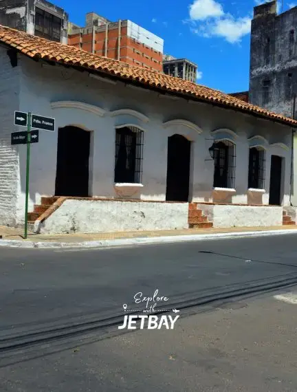 Historic colonial building with terracotta roof tiles showcasing traditional Asuncion architecture