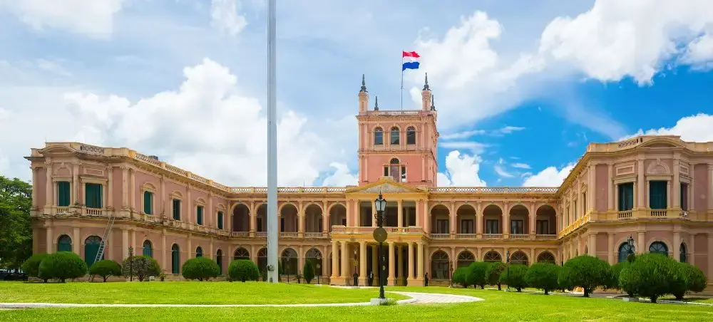 Presidential Palace in Asuncion showcasing Paraguay's pink colonial architecture and manicured grounds