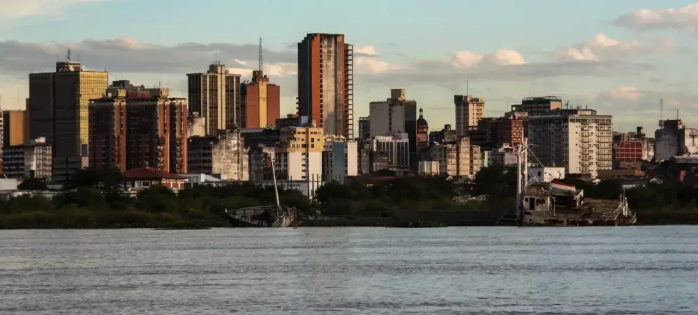 Asuncion skyline viewed from Paraguay River showcasing modern high-rise buildings and waterfront architecture