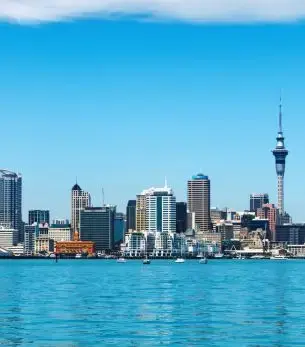 Auckland skyline with Sky Tower and harbor waterfront showcasing New Zealand's largest city destination