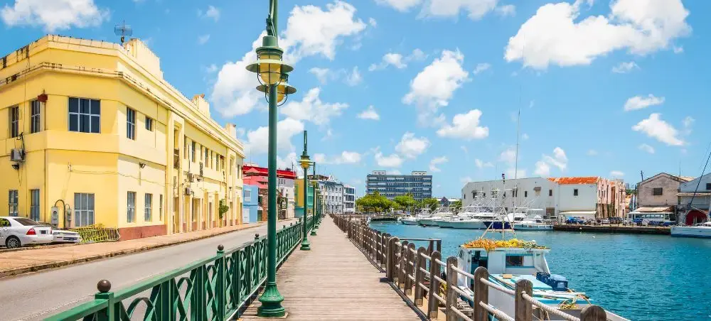 Bridgetown waterfront promenade in Barbados showcasing colonial architecture and marina for luxury travel