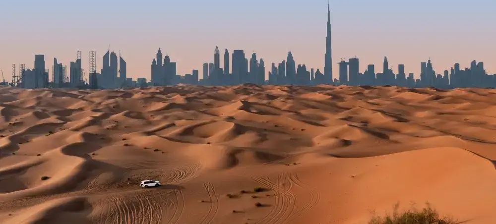 Beach resort and clear coastal waters in Dubai on a private jet charter itinerary