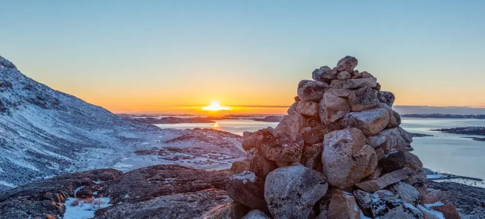 Beach resort and clear coastal waters in Nuuk on a private jet charter itinerary