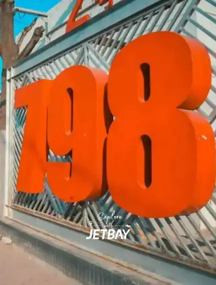Bold orange 1998 numbers displayed at Beijing landmark showcasing the city's modern architectural design