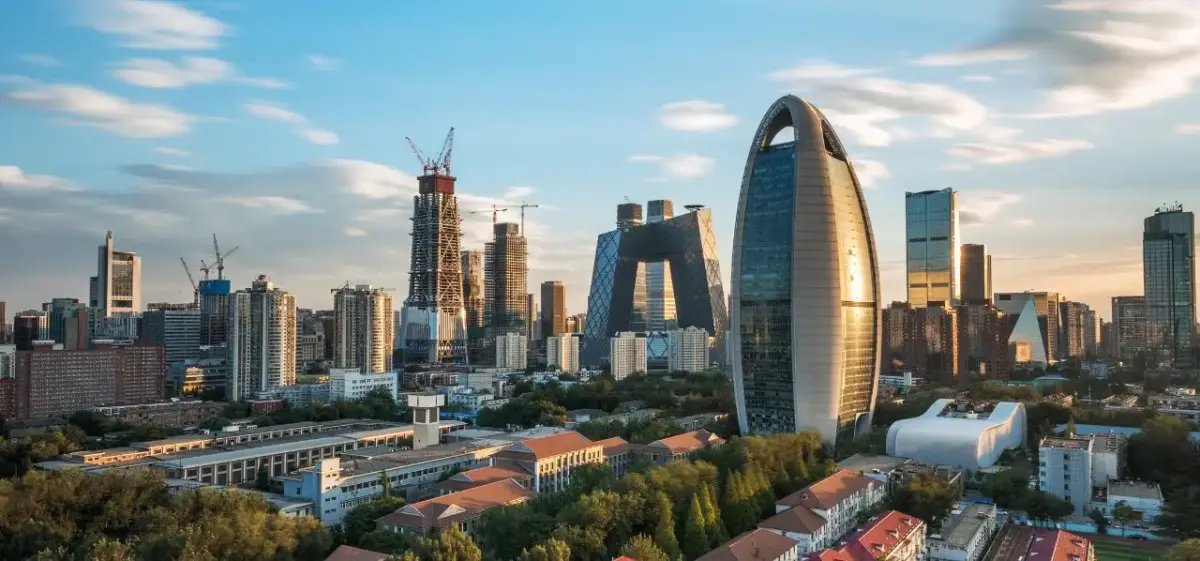 Beijing skyline at golden hour showcasing modern skyscrapers and iconic CCTV Tower architecture