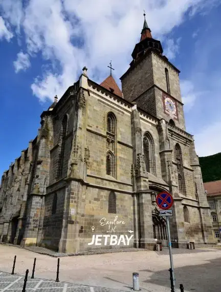 Historic Black Church in Brasov's medieval old town square showcasing Gothic architecture and cultural heritage