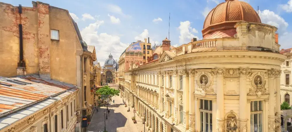 Historic baroque architecture and ornate copper dome showcase Romania's elegant capital city Bucharest