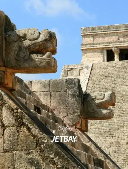 Ancient Mayan serpent sculptures at Chichen Itza pyramid showcase Mexico's rich cultural heritage