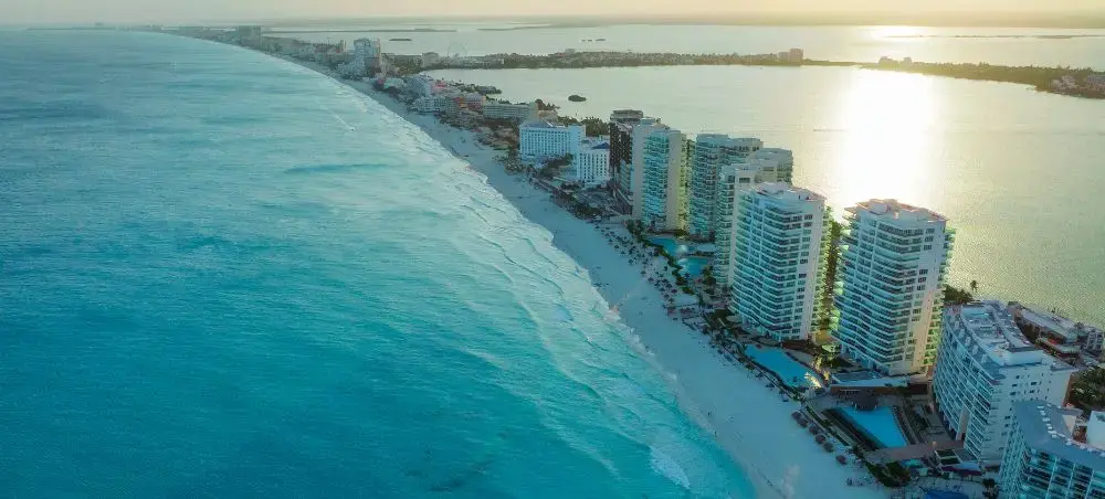 Aerial view of Cancun's Hotel Zone showcasing luxury beachfront resorts along pristine Caribbean coastline