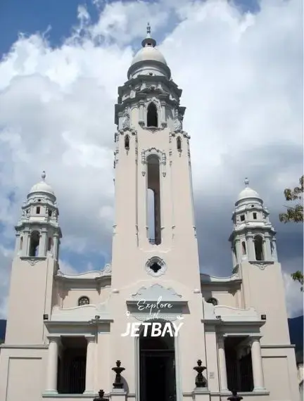 Historic cathedral with twin bell towers and ornate baroque architecture in Caracas Venezuela