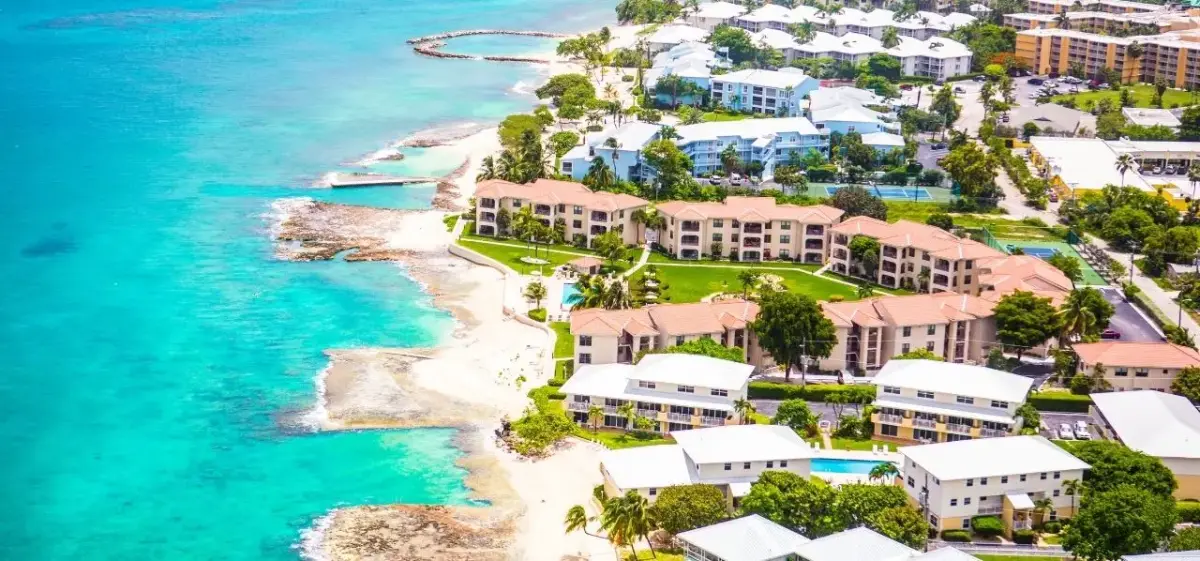 Cayman Islands skyline and waterfront district photographed from a private aircraft on final approach