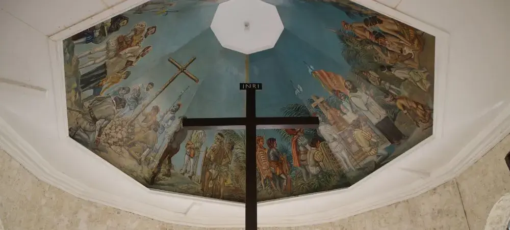 Historic church ceiling mural depicting religious scenes and Filipino cultural heritage in Cebu City