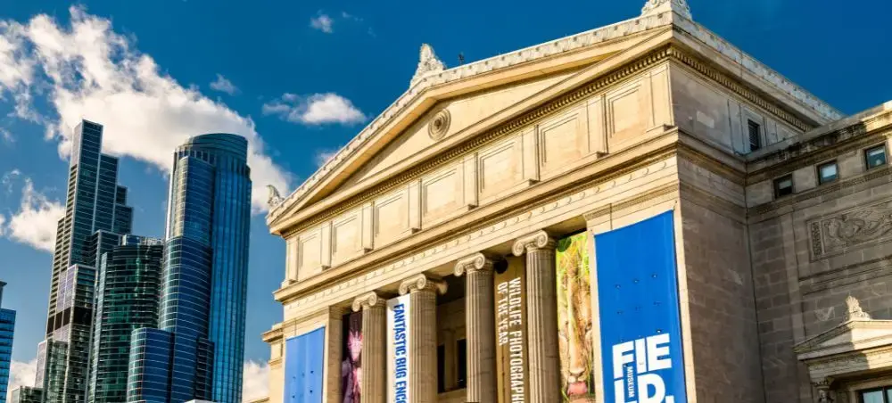 Chicago's Field Museum showcasing classical architecture against modern downtown skyline backdrop