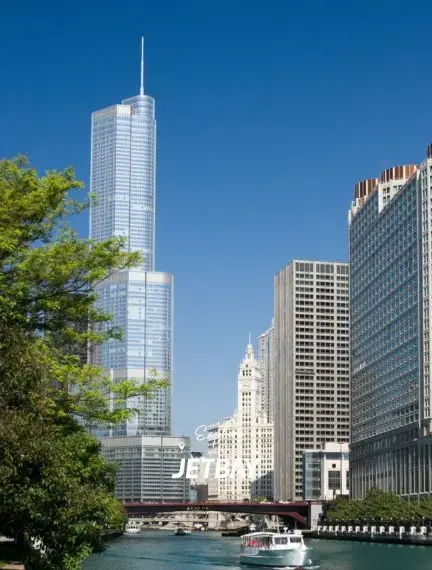 Chicago River waterfront showcasing Willis Tower and downtown skyscrapers for luxury travel destination