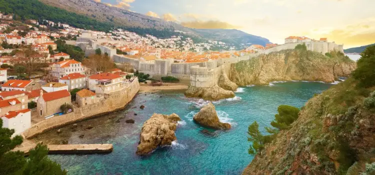 Dubrovnik's historic walled city and turquoise Adriatic coastline at golden hour, Croatia's premier luxury travel destination
