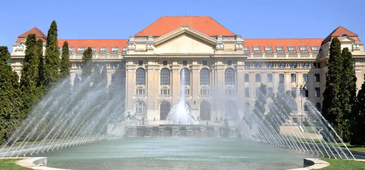 Majestic neoclassical palace with ornate fountains and manicured gardens in Debrecen, Hungary