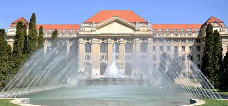 Majestic neoclassical palace with ornate fountains in Debrecen, Hungary's cultural heart and luxury travel destination