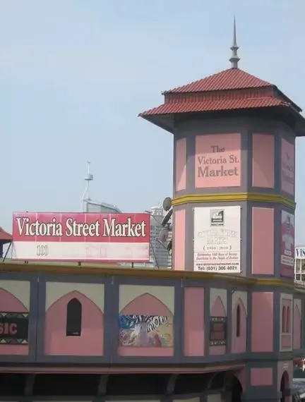 Historic Victoria Street Market building with distinctive pink tower showcasing Durban's vibrant cultural heritage