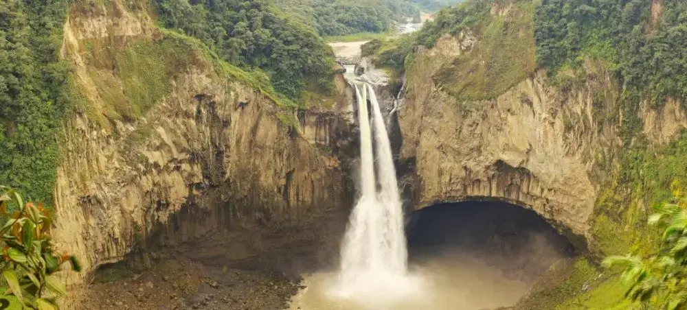 Spectacular waterfall cascading through lush tropical canyon near Encarnacion, Paraguay destination