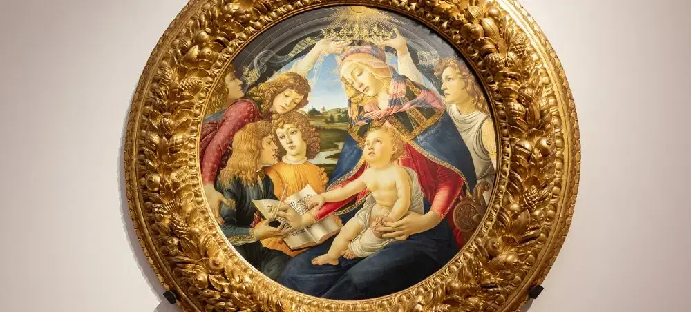 Renaissance Madonna and Child painting in ornate golden frame displayed in Florence museum gallery