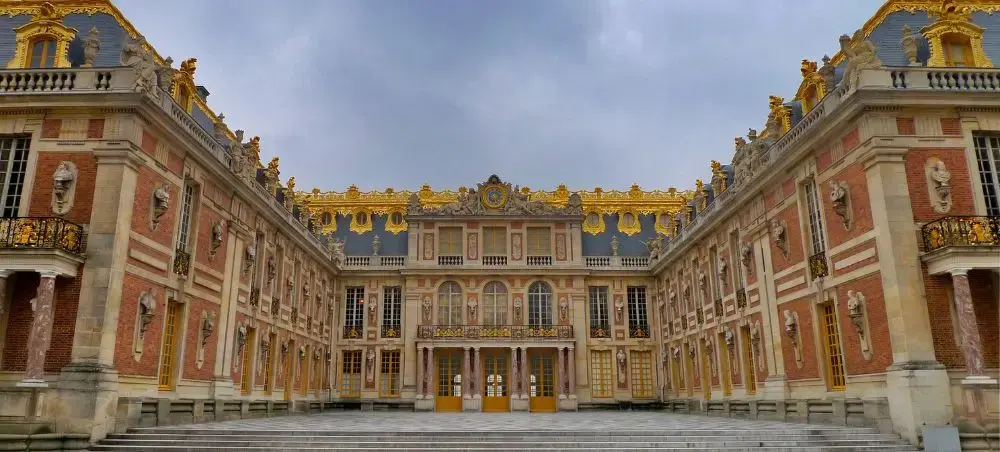Palace of Versailles grand courtyard showcasing France's opulent baroque architecture and royal heritage