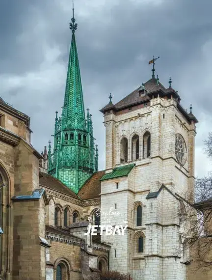 Historic Saint-Pierre Cathedral with distinctive green spire dominates Geneva's old town skyline