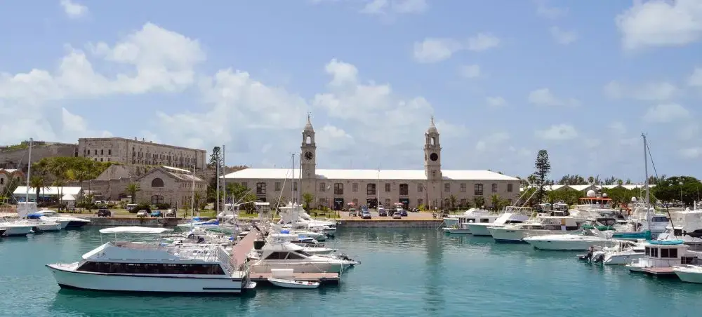 Royal Naval Dockyard marina in Hamilton showcasing luxury yachts and historic Bermuda architecture