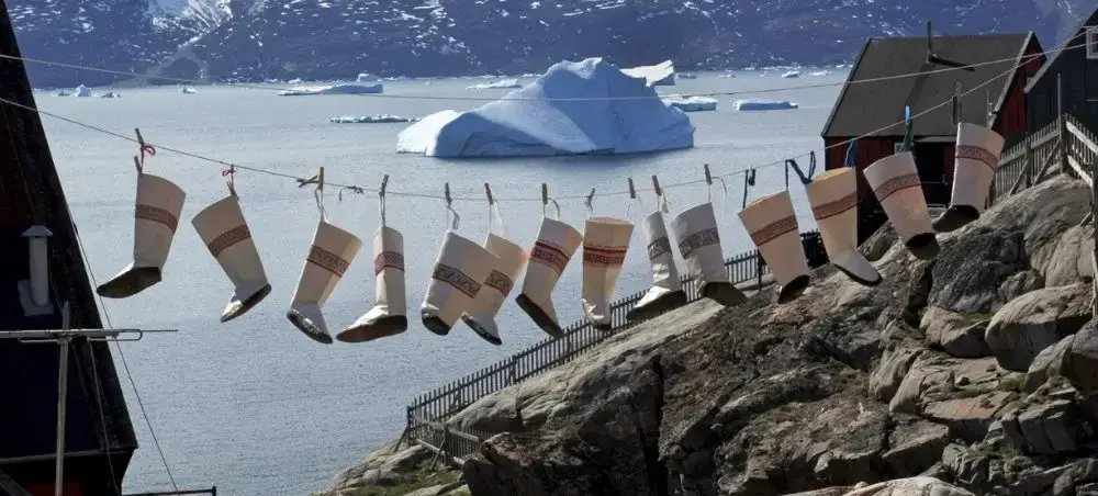 Historic city centre and heritage landmarks of Ilulissat visited by private jet charter guests