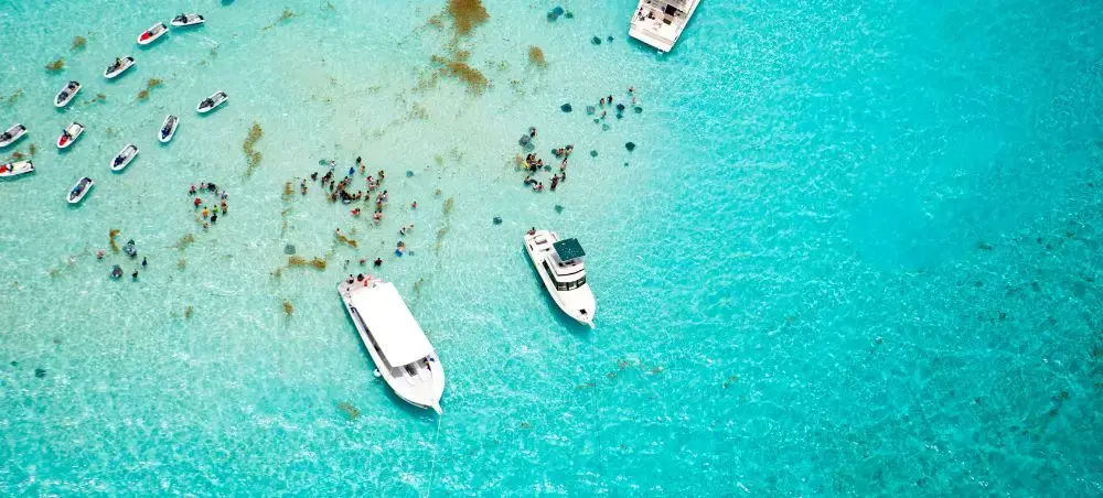 Historic city centre and heritage landmarks of Seven Mile Beach visited by private jet charter guests