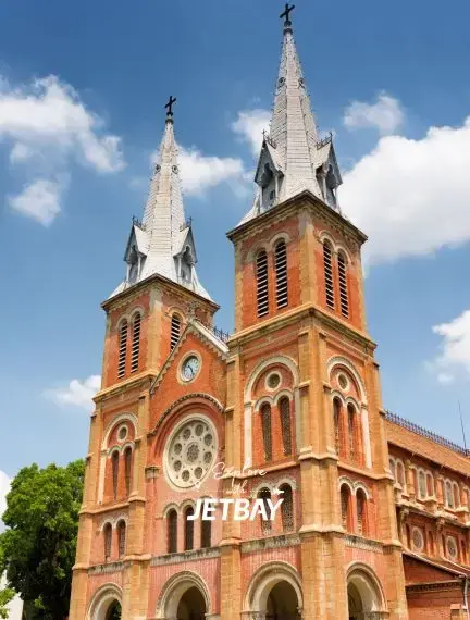 Notre Dame Cathedral's twin spires and red brick facade showcase Ho Chi Minh City's French colonial heritage