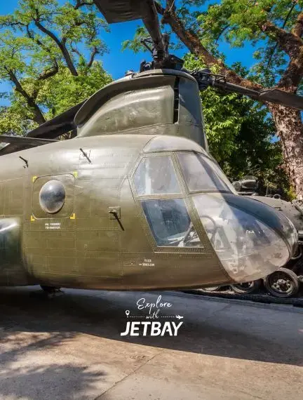 Historic military helicopter display at War Remnants Museum showcasing Vietnam War history in Ho Chi Minh City