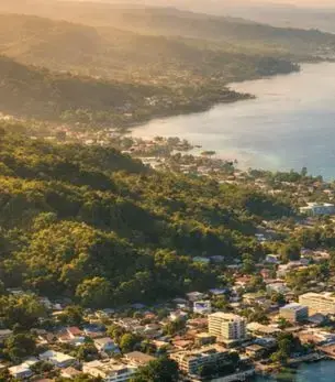 Honiara skyline and landmark attractions seen on descent during a private jet charter approach