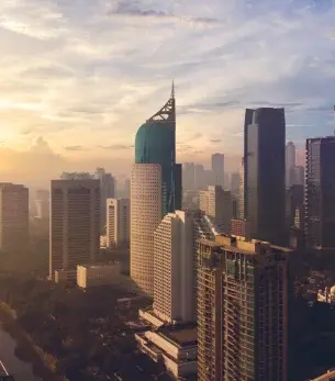 Jakarta skyline at golden hour showcasing modern skyscrapers and urban architecture in Indonesia's capital